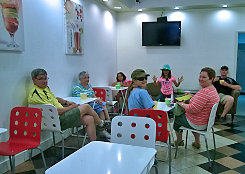 Family Hanging Out at Frozen Yogurt Place