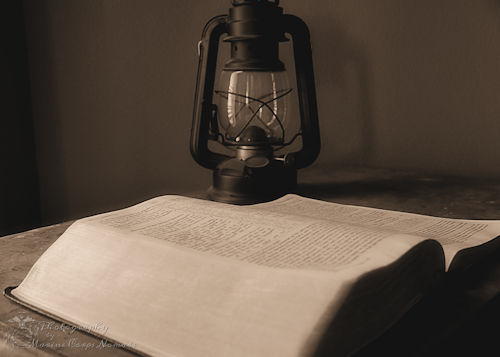 Bible with Oil Lamp