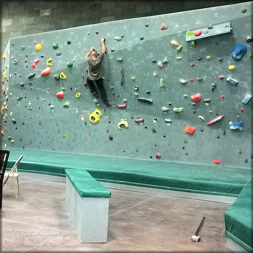 Testing out the holds at Desert Rocks Climbing Gym