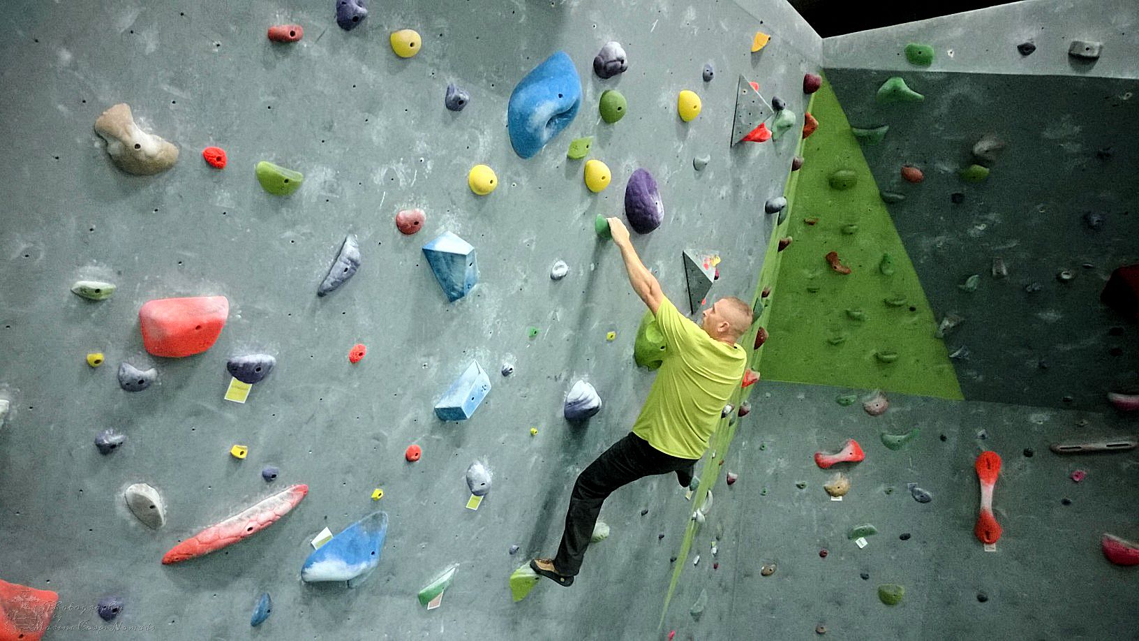 D partially up the route at Desert Rocks Climbing Gym