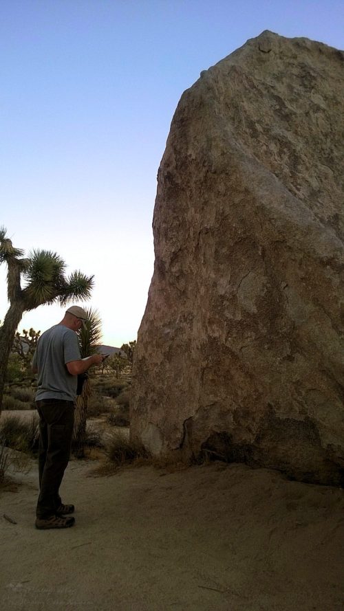 Checking out the problems on the boulder