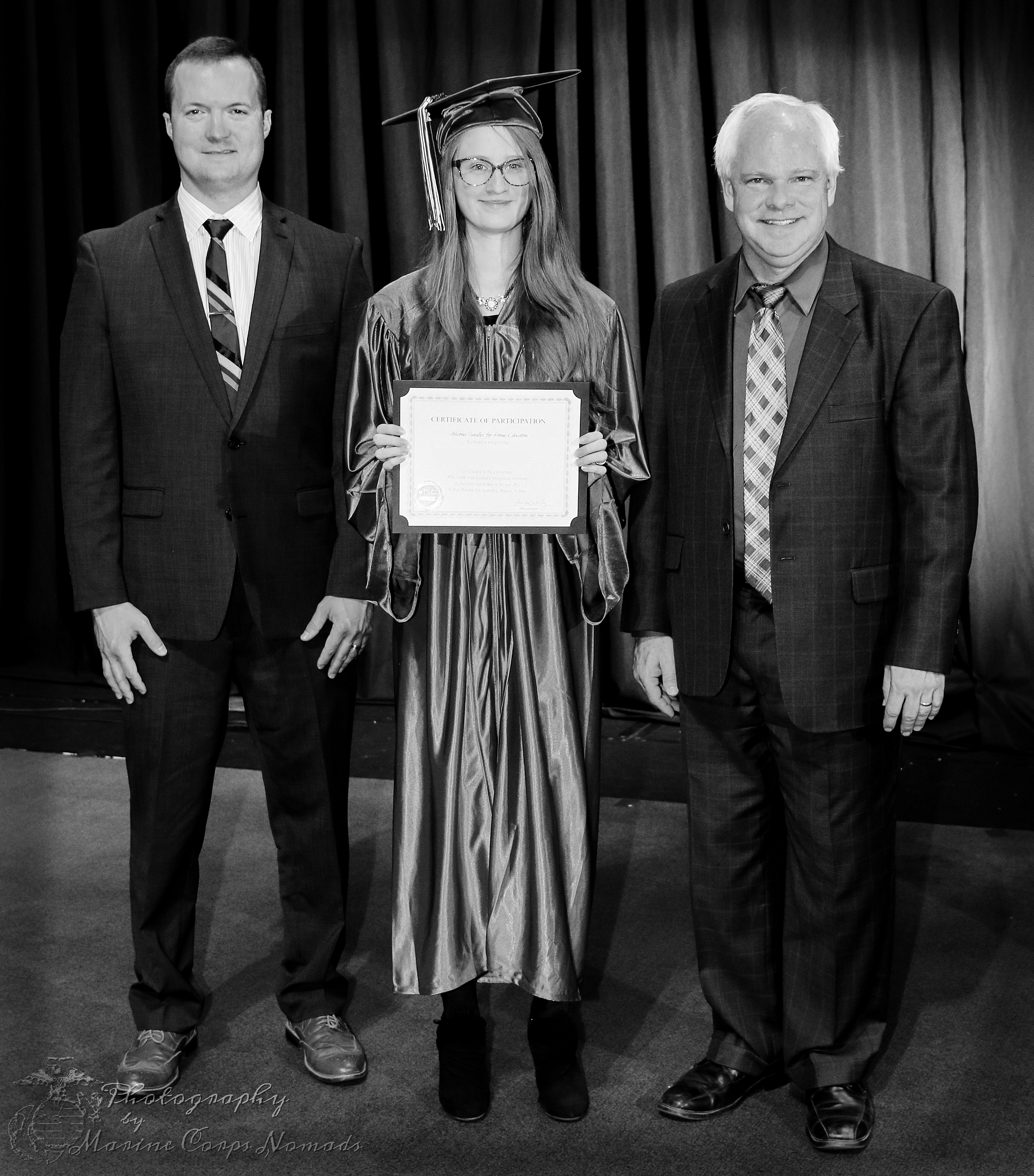 Receiving graduation certificate - class of 2015